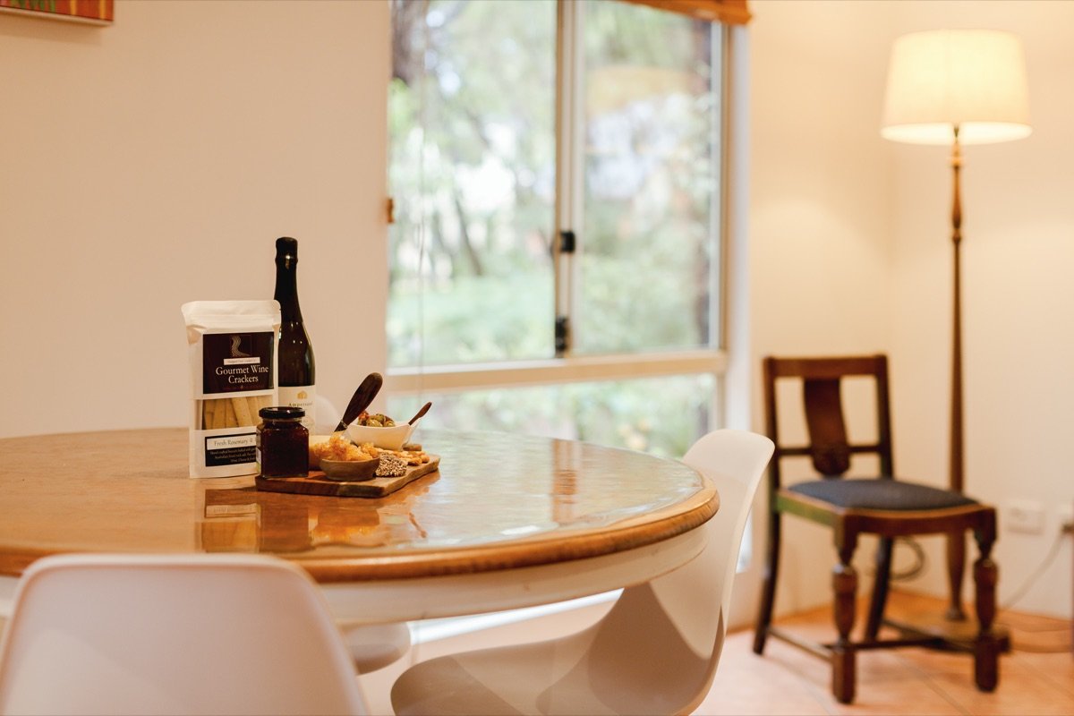 Welcome treats and local wine on the dining table
